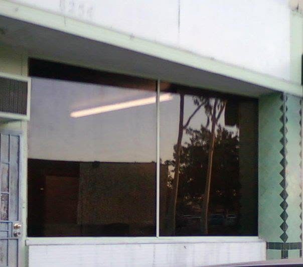 The same commercial storefront after window film installation by TNT Window Tinting